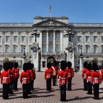 2015-05-27 11:26:11 epa04769781 Grenadier Guards await the departure of Britain's Queen Elizabeth II from Buckingham Palaceto the Palace of Westminster for the Queen's Speech in London, 27 May 2015. The Speech, which marks the official State Opening of Parliamen, outlines the Conservative government's legislative plans over the next five years.  EPA/ANDY RAIN